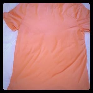 Lightweight peachy colored t-shirt